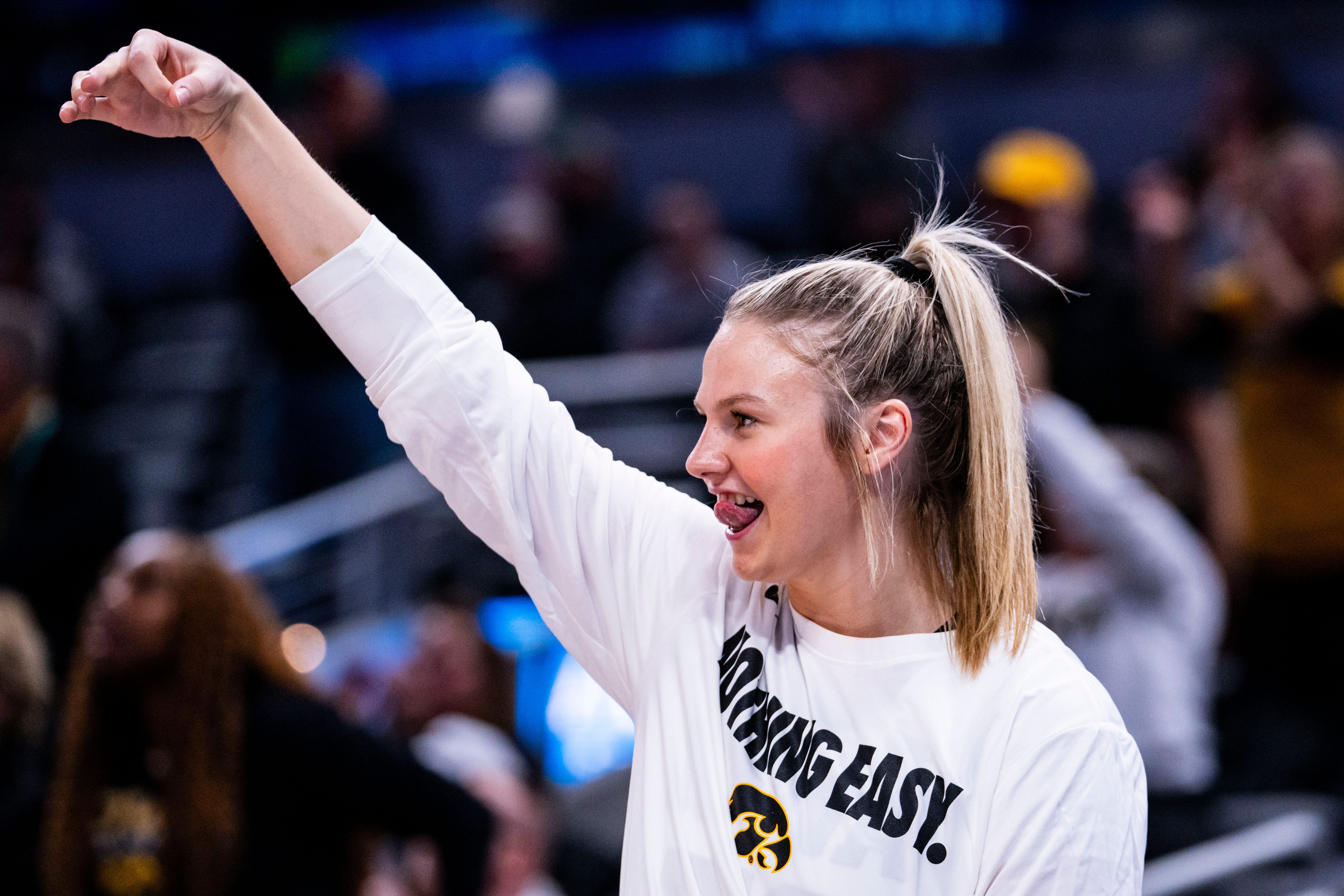 Iowa Hawkeyes guard Callie Levin (#32) celebrates from the bench in their first-round game against the Wisconsin Badgers in the 2025 TIAA Big Ten Women's Basketball Tournament at Gainbridge Fieldhouse in Indianapolis. Photo: Imagn